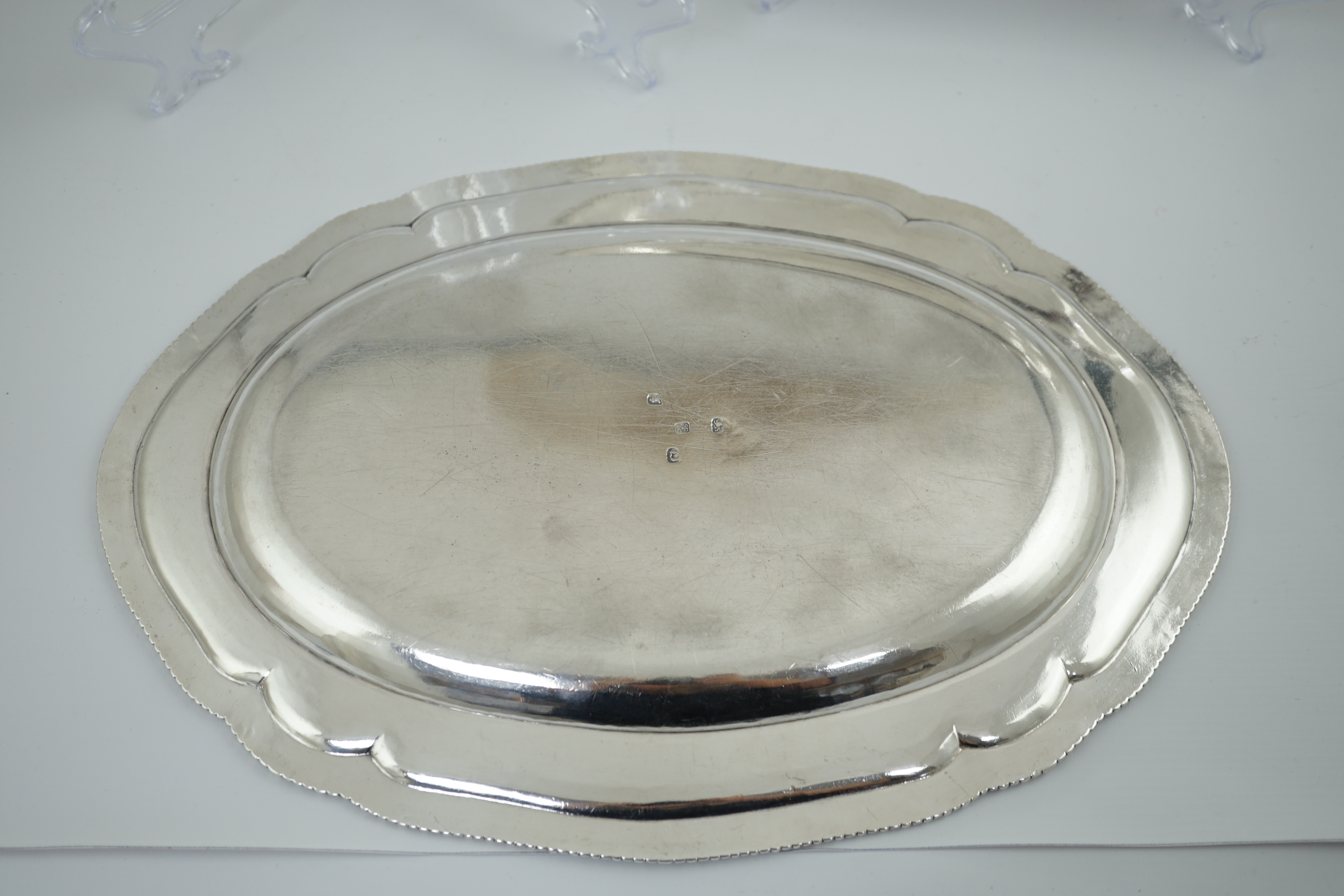 A pair of early George III silver oval meat dishes, by Sebastian & James Crespell